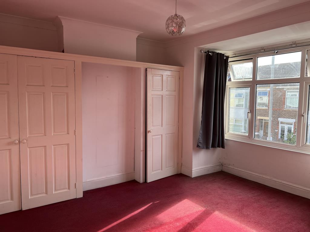 Lot: 78 - END-TERRACE THREE-BEDROOM HOUSE - Bedroom One